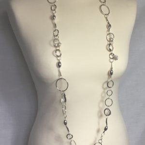 Long silver necklace with cast seaweed detail